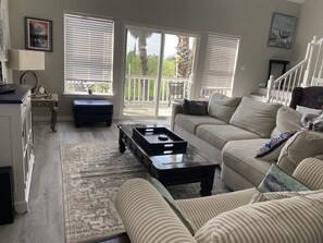 Living room leading to back deck