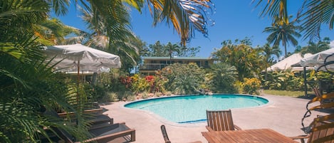 View of Villa Ta'i, from across the pool, top floor of the colonial style house