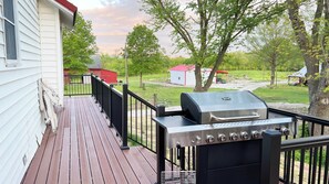 Grill with a view of the barns and woodmill.