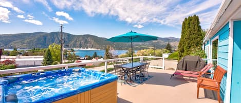 Enjoy the lake and mountain views from your private deck with hot tub, gas grill