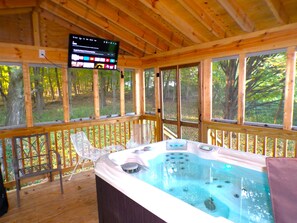 Soak in the hottub on the deck and warm up by the fireplace.