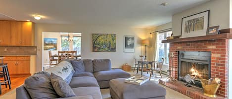 Living room with wood burning fireplace