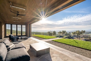 Giant patio with heating lamps to take in the countryside