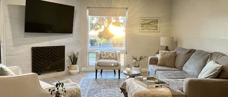 Open living room with daily sunset views