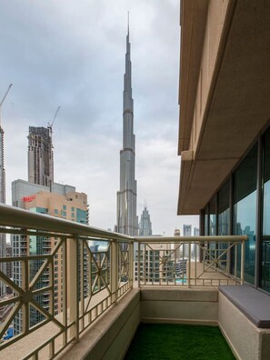 Balcony Oasis: Enjoy breathtaking views of the Burj Khalifa from your private outdoor retreat!