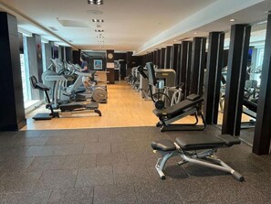 Fitness Center: Energize your stay with state-of-the-art equipment and radiant city views!