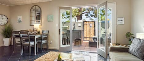 1st floor dining area, living room and a private patio with an outdoor kitchen.