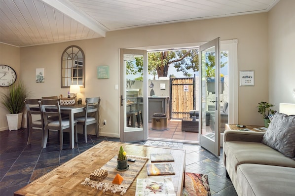 1st floor dining area, living room and a private patio with an outdoor kitchen.