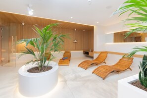 A luxury spa with wooden loungers, ideal for relaxation.
