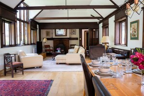 Living room (converted Art Studio) with large wood burning Fire-stove