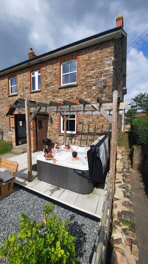 Family enjoying the hot tub.