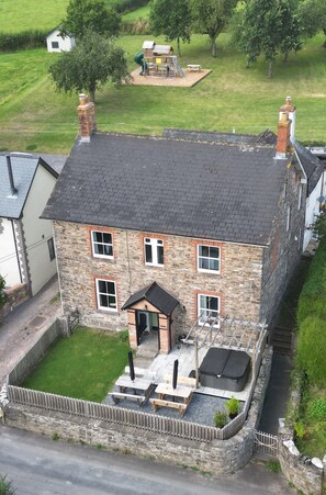 Aerial view of The Elms Holiday Home with orchard/play area. 