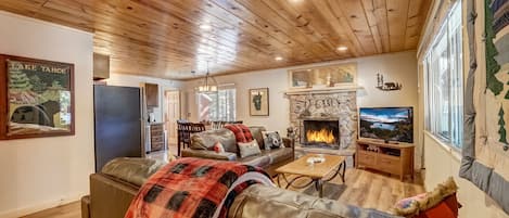 VERY cozy living room with wood fireplace