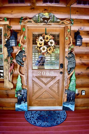 Custom woodwork surrounds the entire front of the cabin 