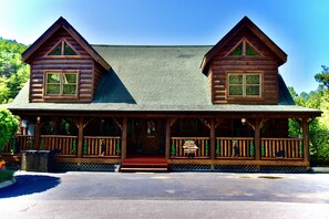 Front of beautiful cabin with plenty of level parking for 4 vehicles