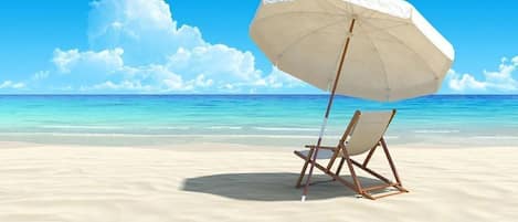 Complimentary Beach Service with Chairs and Umbrella at our Private Beach 