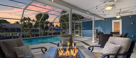 Enjoy this fabulous firepit on the huge, covered lanai at your own private pool.