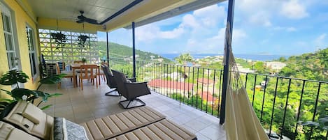 Relax on the oversized veranda with west-facing views of St Thomas and Pillsbury Sound