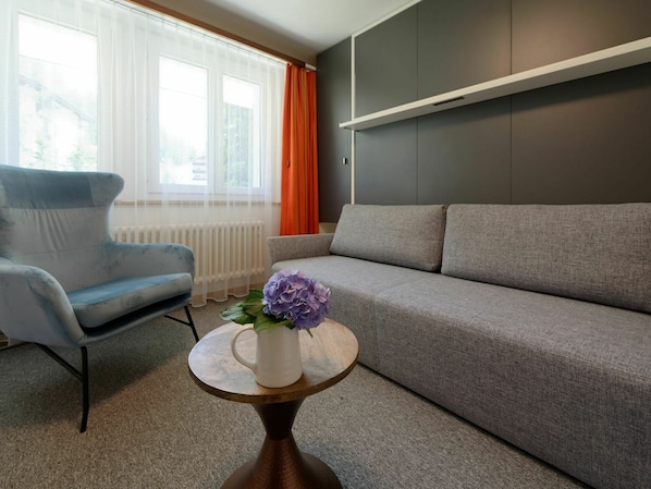 Furniture, Couch, Property, Comfort, Flower, Interior Design, Lighting, Wood, Rectangle