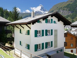 Sky, Building, Mountain, Property, Window, Plant, Cloud, Wood, House, Architecture