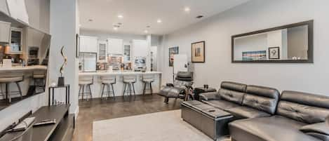 Living RoomLiving Room with 78" curve TV, nanoleaf lights, perfect chair recliner