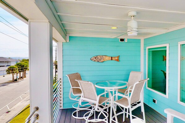 Sit on the top deck, listen to the ocean and watch the sun rise over the beach