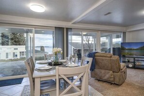 Open Concept Living Room/Dining Room Area with views of Flathead Lake