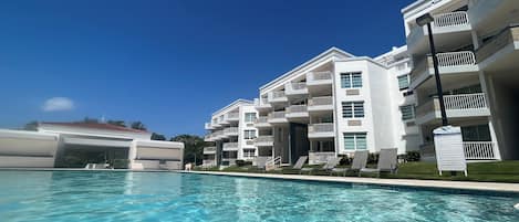 Condominium common area swimming pool. 