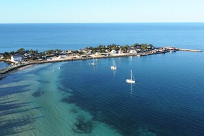 Take in panoramic harbor views right from your balcony.