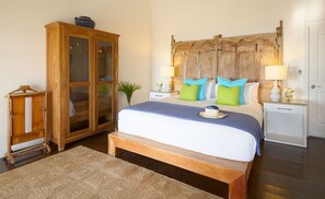 Main bedroom with King bed and magnificent views overlooking the bay.
