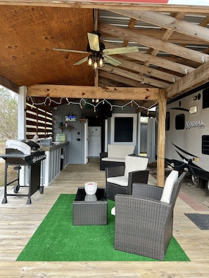 Outside grilling and lounge area. Extra fridge and shower outside as well.