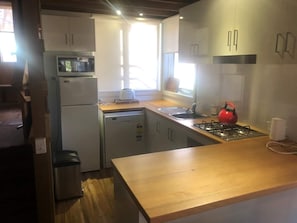 Renovated Kitchen with Dishwasher. As of June 2022 has a Coffee machine as well