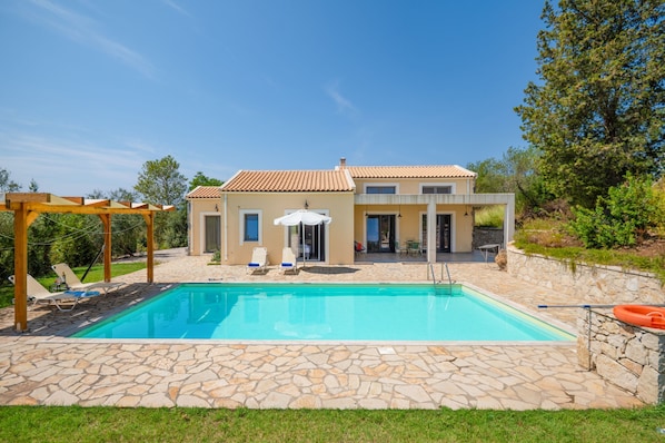 Tasteful morning tones of pool and property