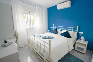 1st Bedroom (Blue) with a King Sized Bed for 2