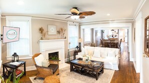 Open style layout from living room, sitting area, dining space, into the kitchen