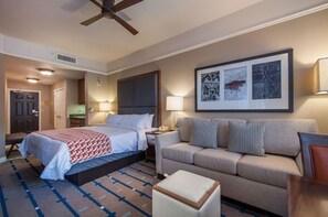 A spacious room with a living space.