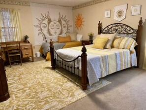 Sunshine suite. Queen and twin bed. Desk. Master bedroom with bathroom. 