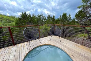 A plunge pool with sitting area allows you to enjoy views anytime