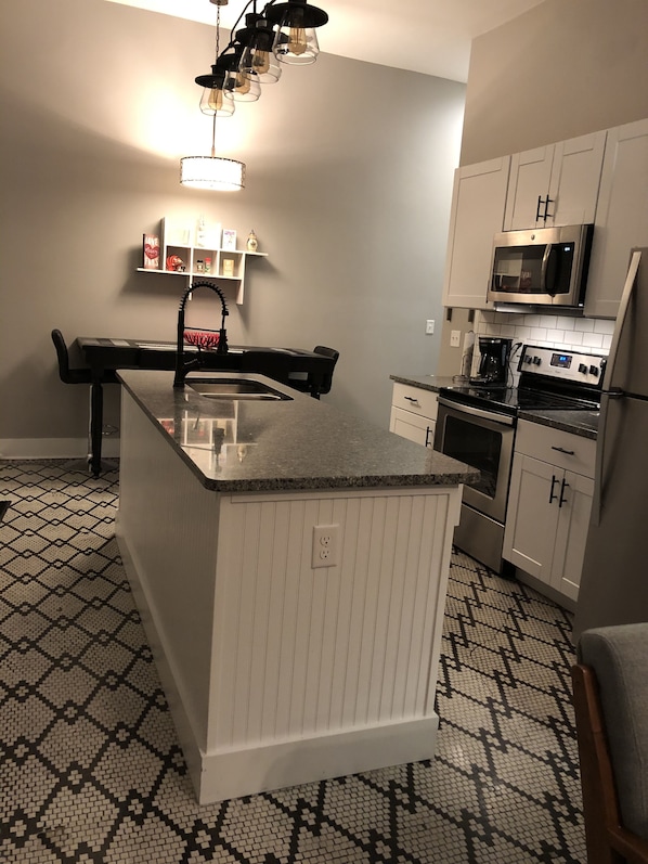 Fully equipped kitchen with a large island.