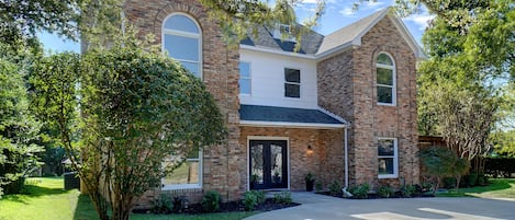 Front of house with circular driveway