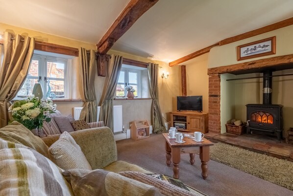 Church Cottage, Castle Acre: A cosy country cottage sitting room