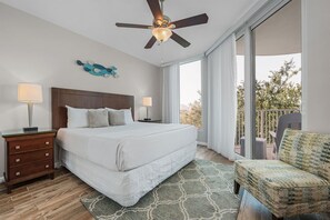 🛏️ King Suite: Spacious bedroom with an en suite bathroom and tub combo (sleeps 2) w/ Balcony