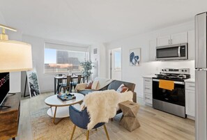 A stylish and modern 2BR/3BA beachfront CozySuites await you!