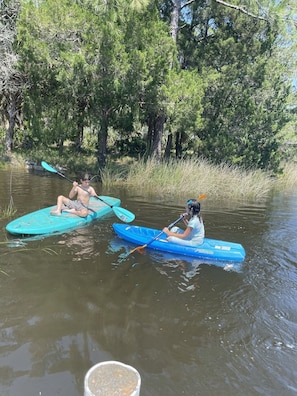 Paddle boarding and kayaking in the creek