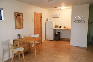 Kitchen area is stocked with tea and coffee making supplies.