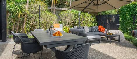 Outdoor Table seats 6, plus loungers