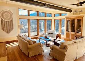 Your spacious living room with a grand view of the Mountain, Meadows & Woods.