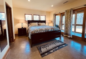 A king size bed, heated floors and en-suite bathroom await you in the master BR.