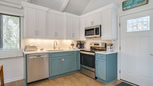Coastal kitchen charm, perfect for cooking meals in