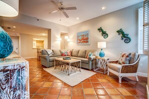 Bask in the living room's inviting ambiance with an abundance of natural light that fills the space.